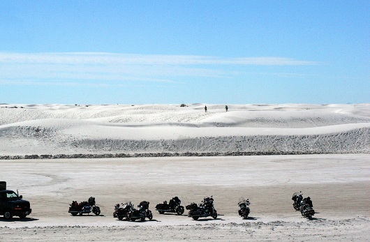 Orange & Black motorcycle tour group in White Sand National Monument